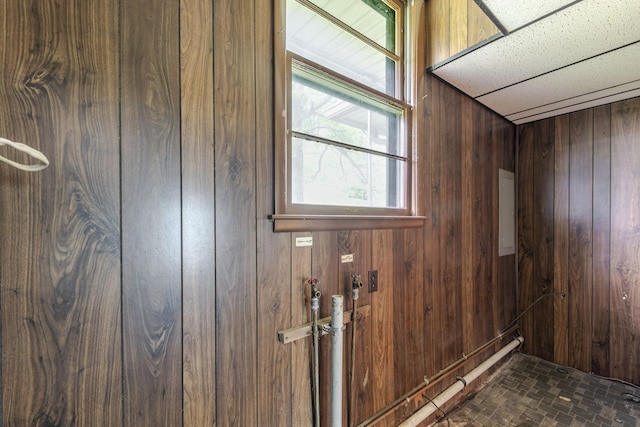 details featuring wood walls