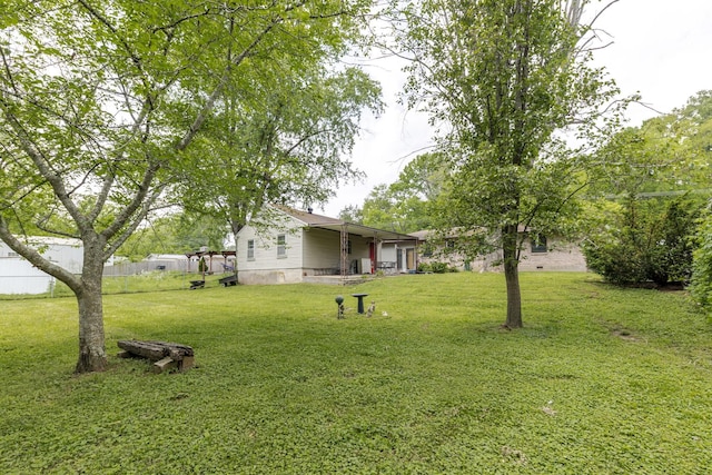 view of yard with fence