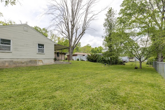 view of yard featuring fence