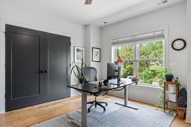 office featuring visible vents and light wood-style flooring