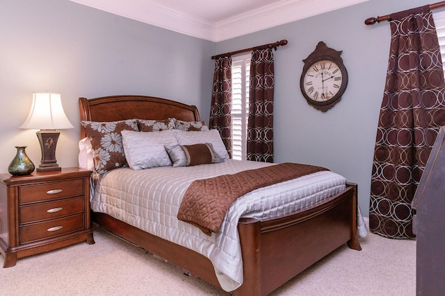 bedroom with light colored carpet and ornamental molding
