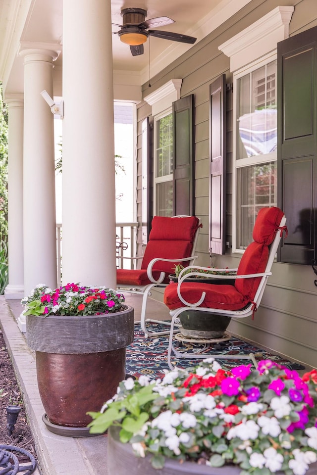 view of patio with a ceiling fan and a porch