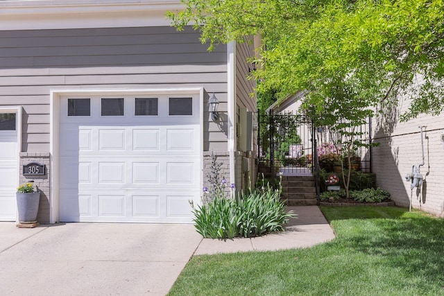 garage with concrete driveway