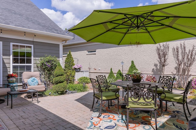 view of patio with outdoor dining space