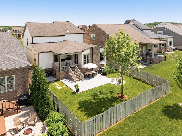 449 River Bluff Dr, Franklin, TN 37064 - back of property featuring a residential view, a fenced backyard, and a patio area