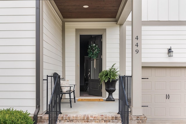 449 River Bluff Dr, Franklin, TN 37064 - doorway to property featuring a garage and covered porch