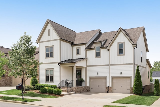 449 River Bluff Dr, Franklin, TN 37064 - view of front of home with a garage, a shingled roof, board and batten siding, and concrete driveway