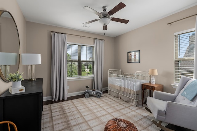 449 River Bluff Dr, Franklin, TN 37064 - bedroom with baseboards, multiple windows, a crib, and visible vents