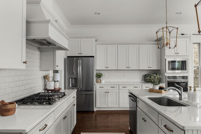 449 River Bluff Dr, Franklin, TN 37064 - kitchen featuring a sink, premium range hood, decorative backsplash, and stainless steel appliances