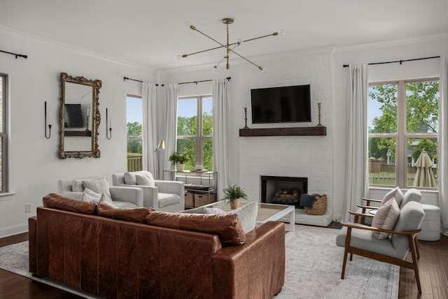 449 River Bluff Dr, Franklin, TN 37064 - living room with crown molding, wood finished floors, and a notable chandelier