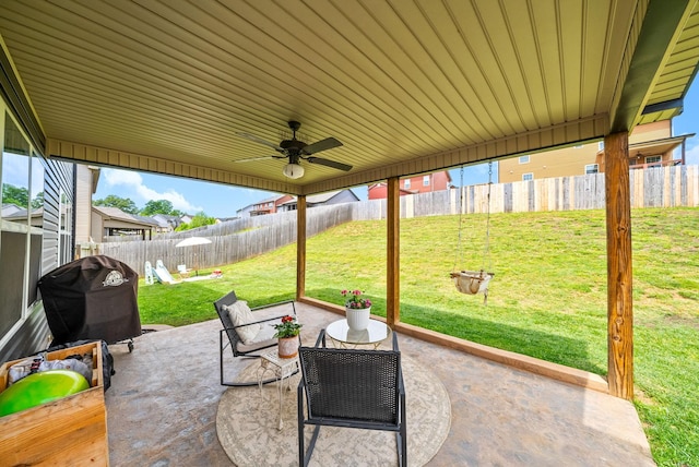 view of patio with a fenced backyard, ceiling fan, and area for grilling