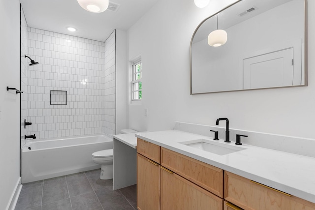 bathroom with visible vents, tile patterned flooring, toilet, and vanity