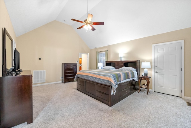 carpeted bedroom featuring visible vents, a ceiling fan, baseboards, and vaulted ceiling