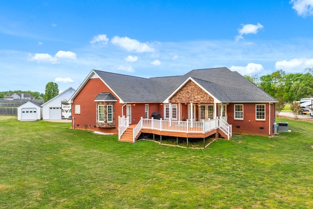 rear view of property featuring a lawn, brick siding, and crawl space