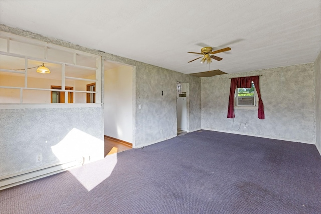 carpeted spare room featuring ceiling fan, baseboard heating, and cooling unit
