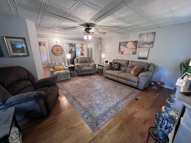 104 Brown Ln, Tracy City, TN 37387 - living room with an ornate ceiling, a ceiling fan, wood finished floors, and baseboards