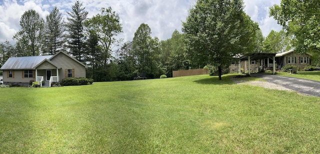 104 Brown Ln, Tracy City, TN 37387 - view of grassy yard with asphalt driveway