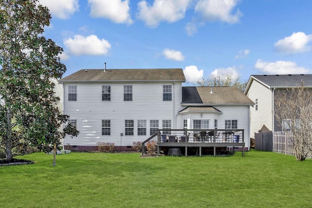 back of house with a yard, crawl space, and a wooden deck