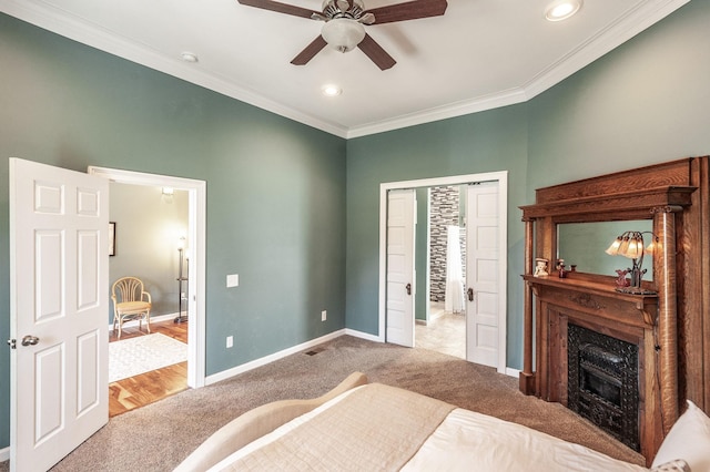 108 High St, Portland, TN 37148 - carpeted bedroom featuring baseboards, ornamental molding, recessed lighting, a fireplace, and a ceiling fan