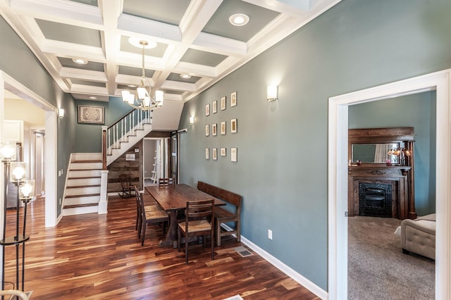 108 High St, Portland, TN 37148 - dining room featuring stairs, a chandelier, dark wood-type flooring, beamed ceiling, and baseboards