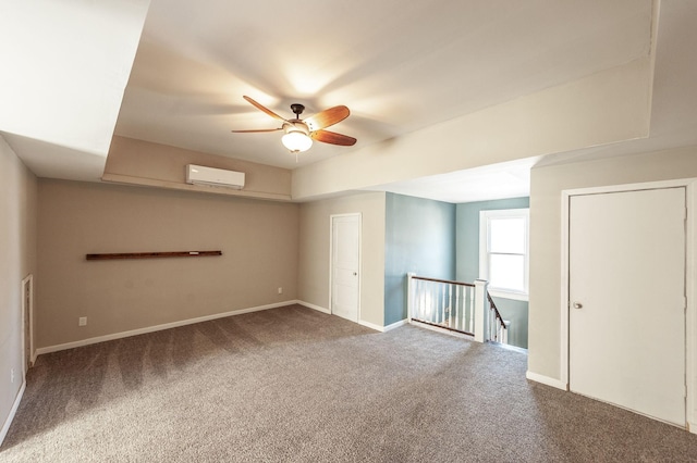 108 High St, Portland, TN 37148 - spare room featuring carpet, a ceiling fan, a wall unit AC, and baseboards