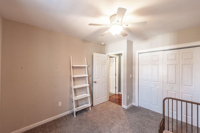 108 High St, Portland, TN 37148 - unfurnished bedroom featuring dark colored carpet, a closet, baseboards, and ceiling fan
