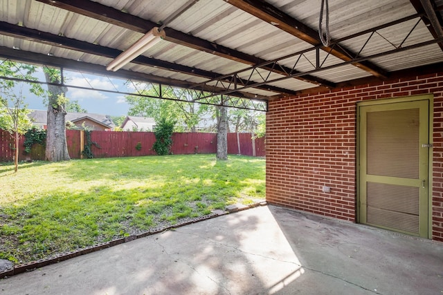 view of yard featuring a patio and a fenced backyard