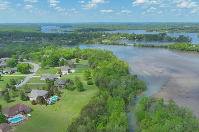 bird's eye view featuring a water view and a view of trees