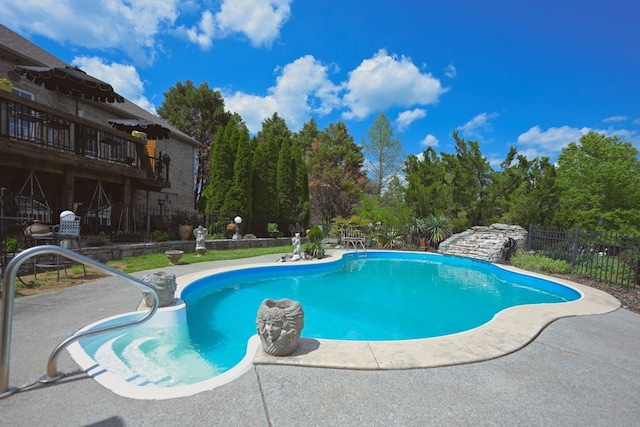 view of pool featuring a fenced in pool, a patio area, and fence