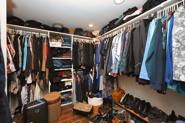 spacious closet featuring wood finished floors