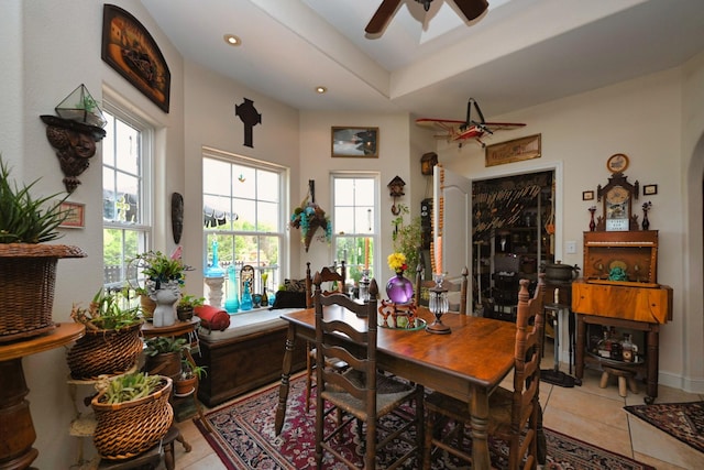 tiled dining area featuring ceiling fan and recessed lighting