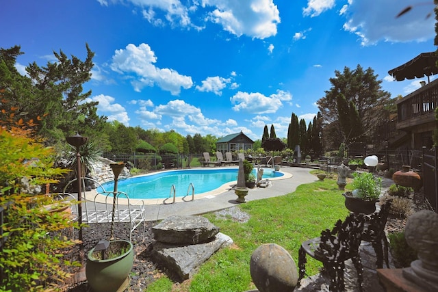 pool with fence and a patio area
