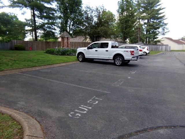801 Laurel Hill Dr Unit 801, Old Hickory, TN 37138 - uncovered parking lot featuring fence