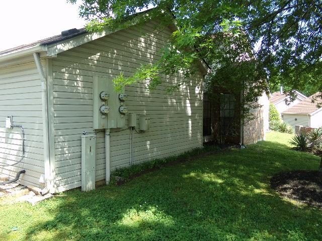 801 Laurel Hill Dr Unit 801, Old Hickory, TN 37138 - view of side of home with a lawn