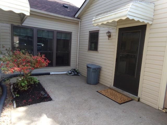 801 Laurel Hill Dr Unit 801, Old Hickory, TN 37138 - entrance to property with a patio and roof with shingles