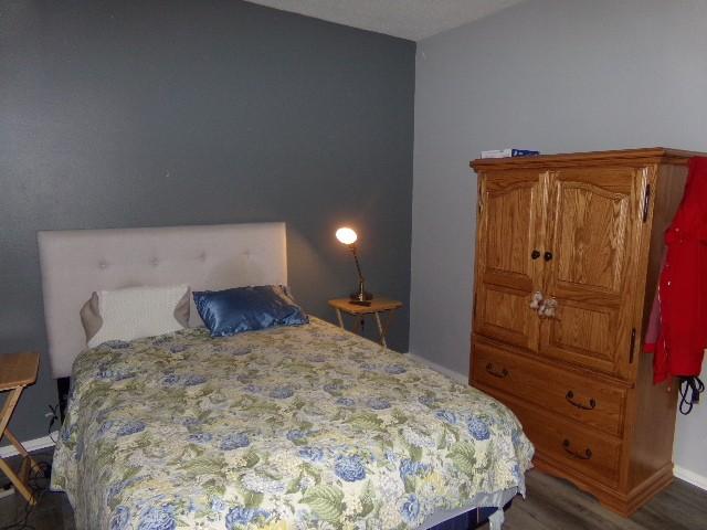 801 Laurel Hill Dr Unit 801, Old Hickory, TN 37138 - bedroom with baseboards and wood finished floors