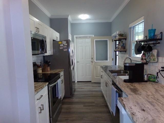 801 Laurel Hill Dr Unit 801, Old Hickory, TN 37138 - kitchen with open shelves, decorative backsplash, white cabinetry, and appliances with stainless steel finishes