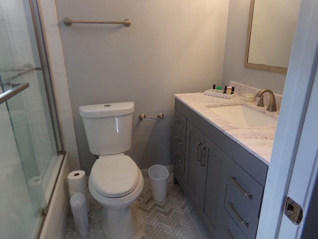 801 Laurel Hill Dr Unit 801, Old Hickory, TN 37138 - bathroom featuring vanity, a shower with shower door, and toilet