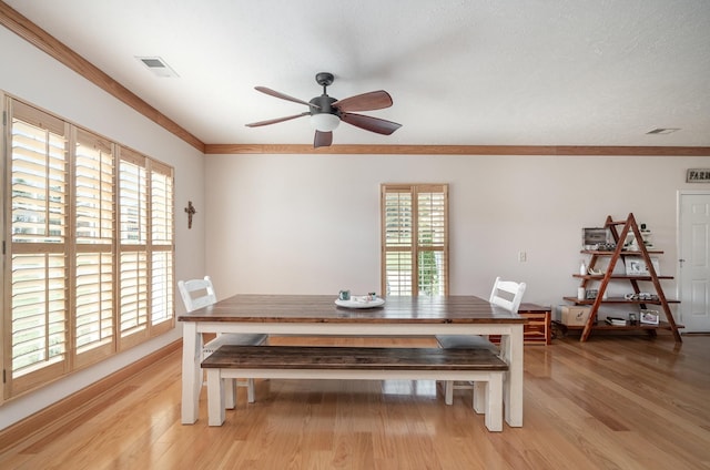 195 Spring Creek Ln, Lebanon, TN 37090 - dining area featuring a ceiling fan, visible vents, ornamental molding, and light wood-style floors