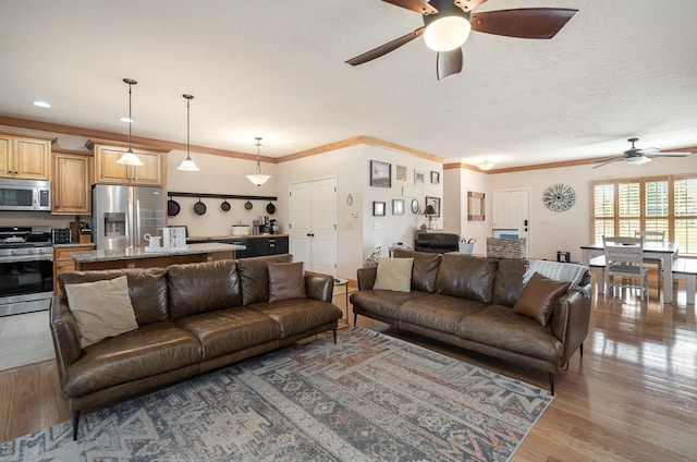 195 Spring Creek Ln, Lebanon, TN 37090 - living area featuring recessed lighting, a ceiling fan, wood finished floors, and ornamental molding