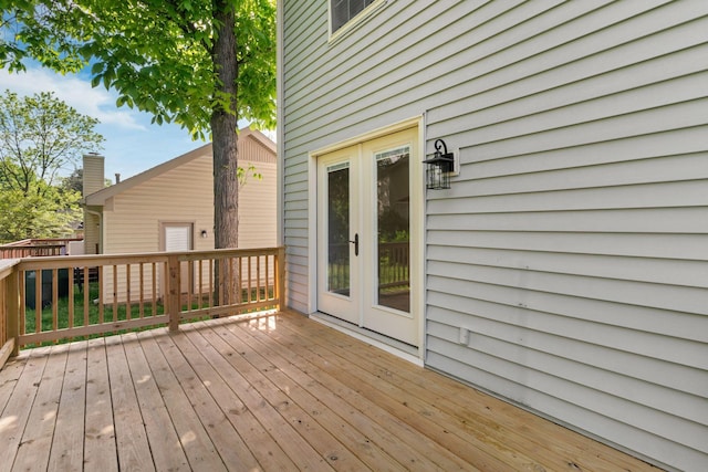 wooden deck featuring french doors