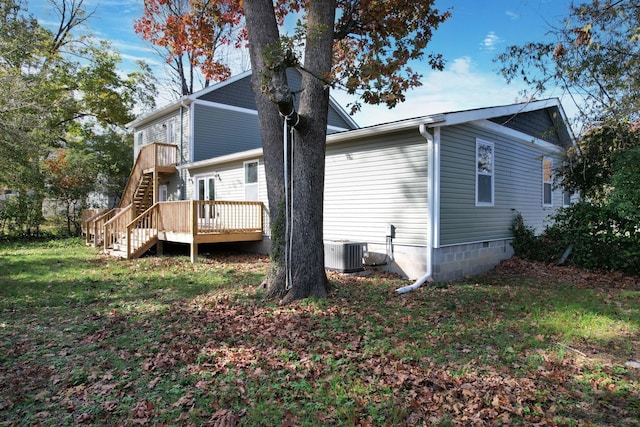 1024 Hurst St, Chattanooga, TN 37412 - rear view of house with stairs, cooling unit, a wooden deck, a yard, and crawl space