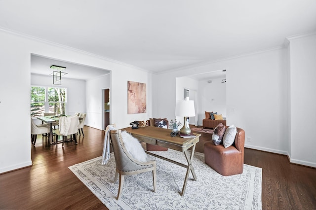 living room featuring crown molding and wood finished floors