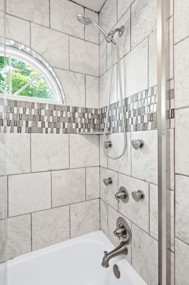 bathroom with shower / bathtub combination