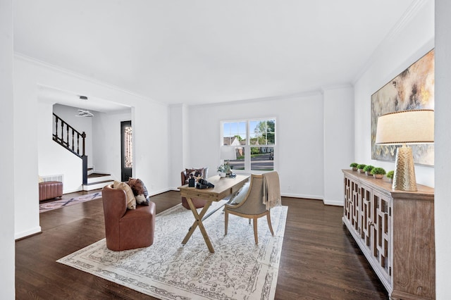 office with crown molding, baseboards, and wood finished floors