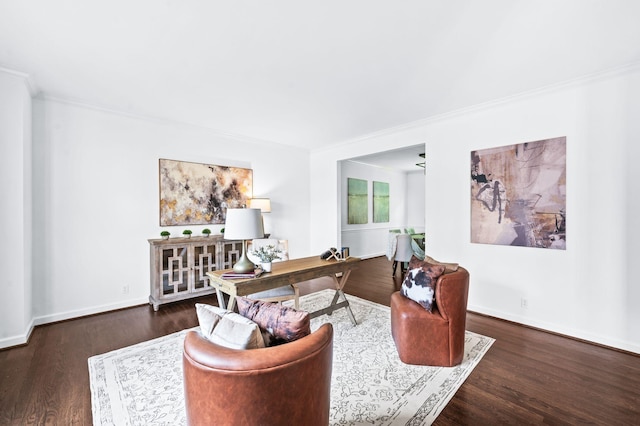 home office featuring baseboards, ornamental molding, and wood finished floors