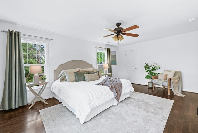 bedroom featuring ceiling fan and wood finished floors