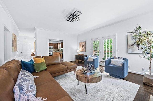 living area featuring dark wood-type flooring, ornamental molding, baseboards, and french doors