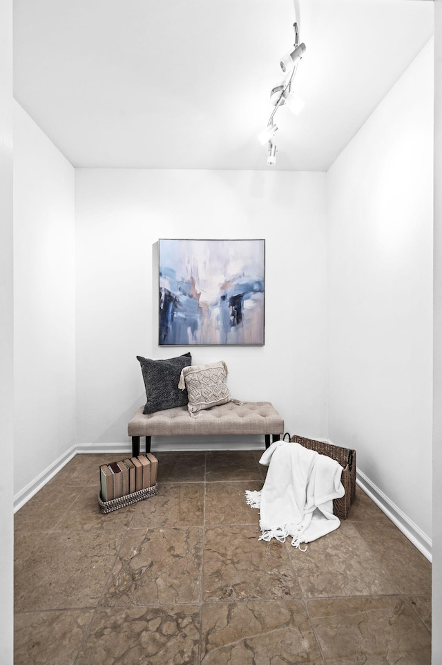 sitting room featuring baseboards