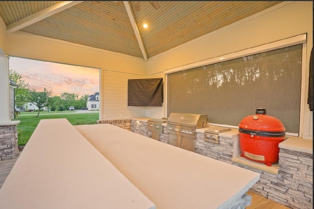 8119 Schweitzer Pl, Arrington, TN 37014 - patio terrace at dusk featuring exterior kitchen and grilling area